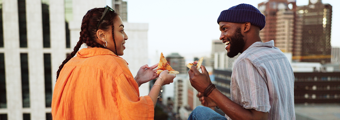 Couple Eating Pizza