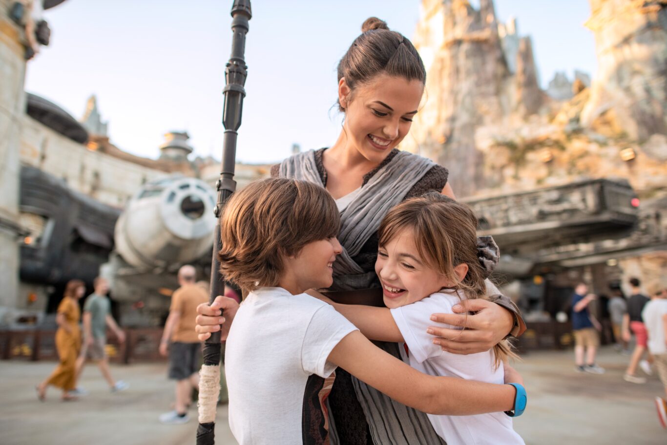 star wars character with children in theme park